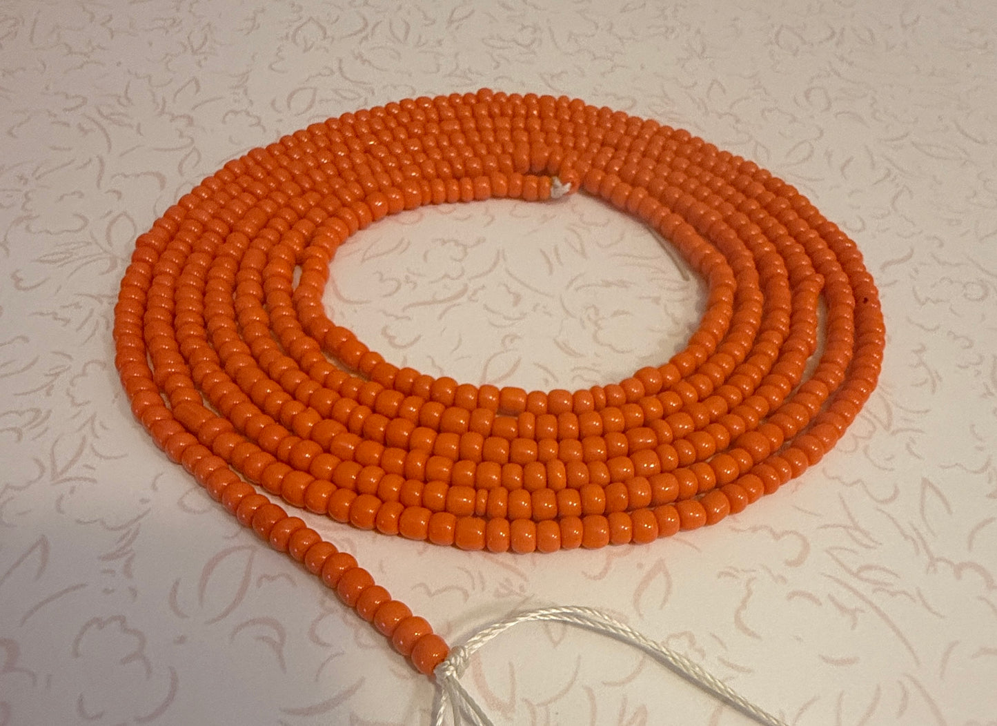 Orange waist beads